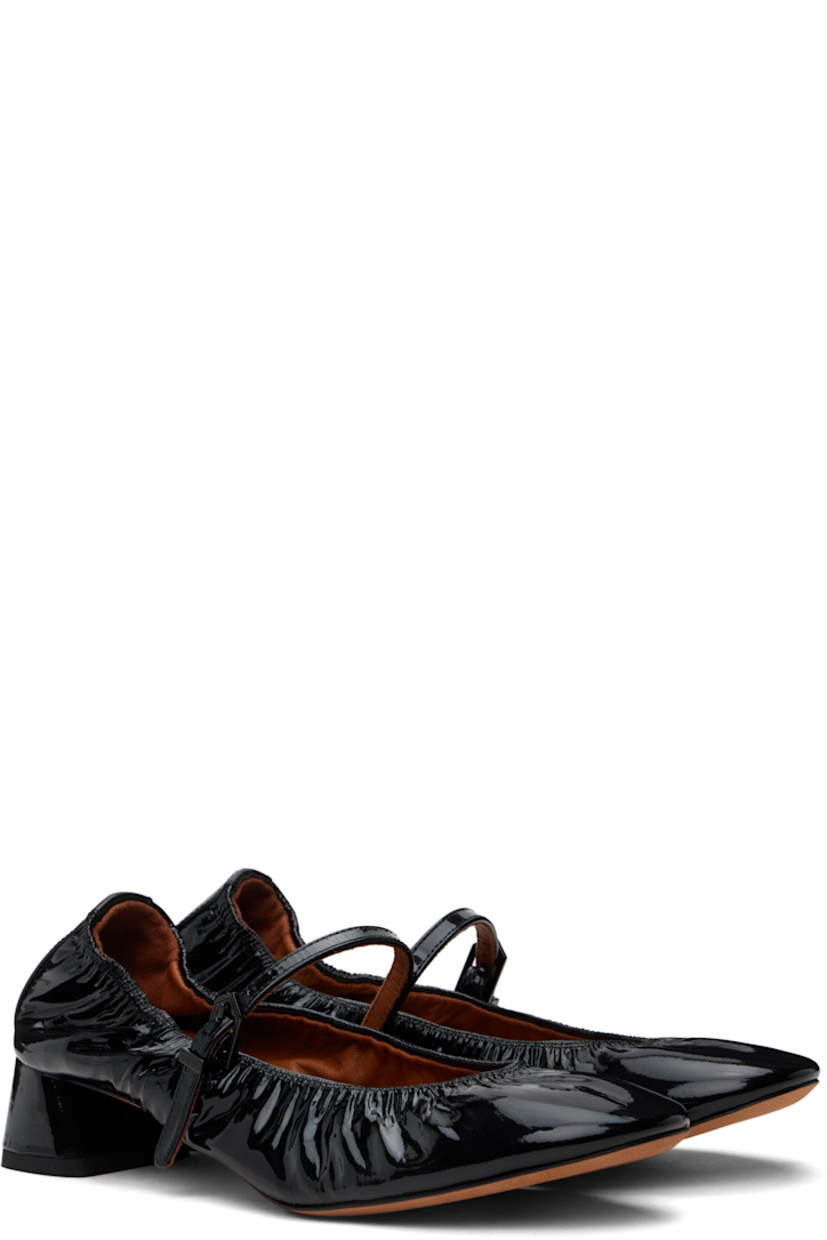 Patent calfskin Mary Jane-style heels in black.

· Pin-buckle strap at vamp
· Gathering at elasticized collar
· Logo stamp at heel tab
· Buffed goatskin lining
· Covered block heel with rubber injection
· Leather sole
· Heel: H1.25"

Supplier color: Black