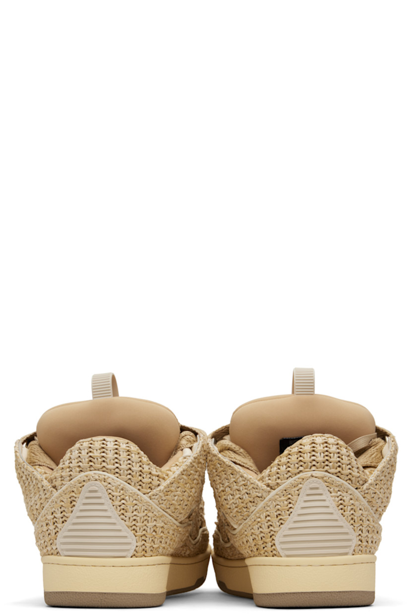 Low-top woven faux-raffia and grained calfskin sneakers in beige.

· Piping, cutouts, and rubberized trim throughout
· Logo embossed at toe
· Lace-up closure
· Logo plaque and pull-loop at tongue
· Padded tongue and collar
· Jersey lining
· Treaded rubber sole

Supplier color: Natural