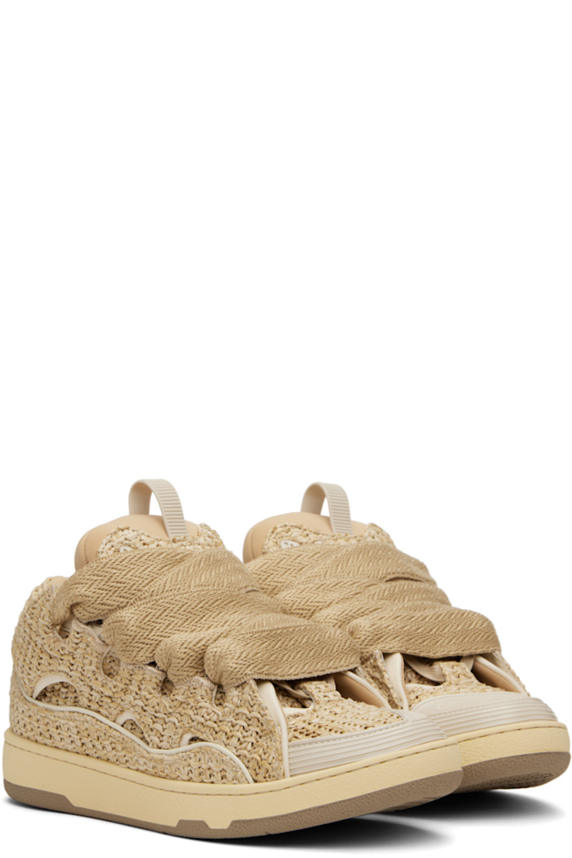 Low-top woven faux-raffia and grained calfskin sneakers in beige.

· Piping, cutouts, and rubberized trim throughout
· Logo embossed at toe
· Lace-up closure
· Logo plaque and pull-loop at tongue
· Padded tongue and collar
· Jersey lining
· Treaded rubber sole

Supplier color: Natural