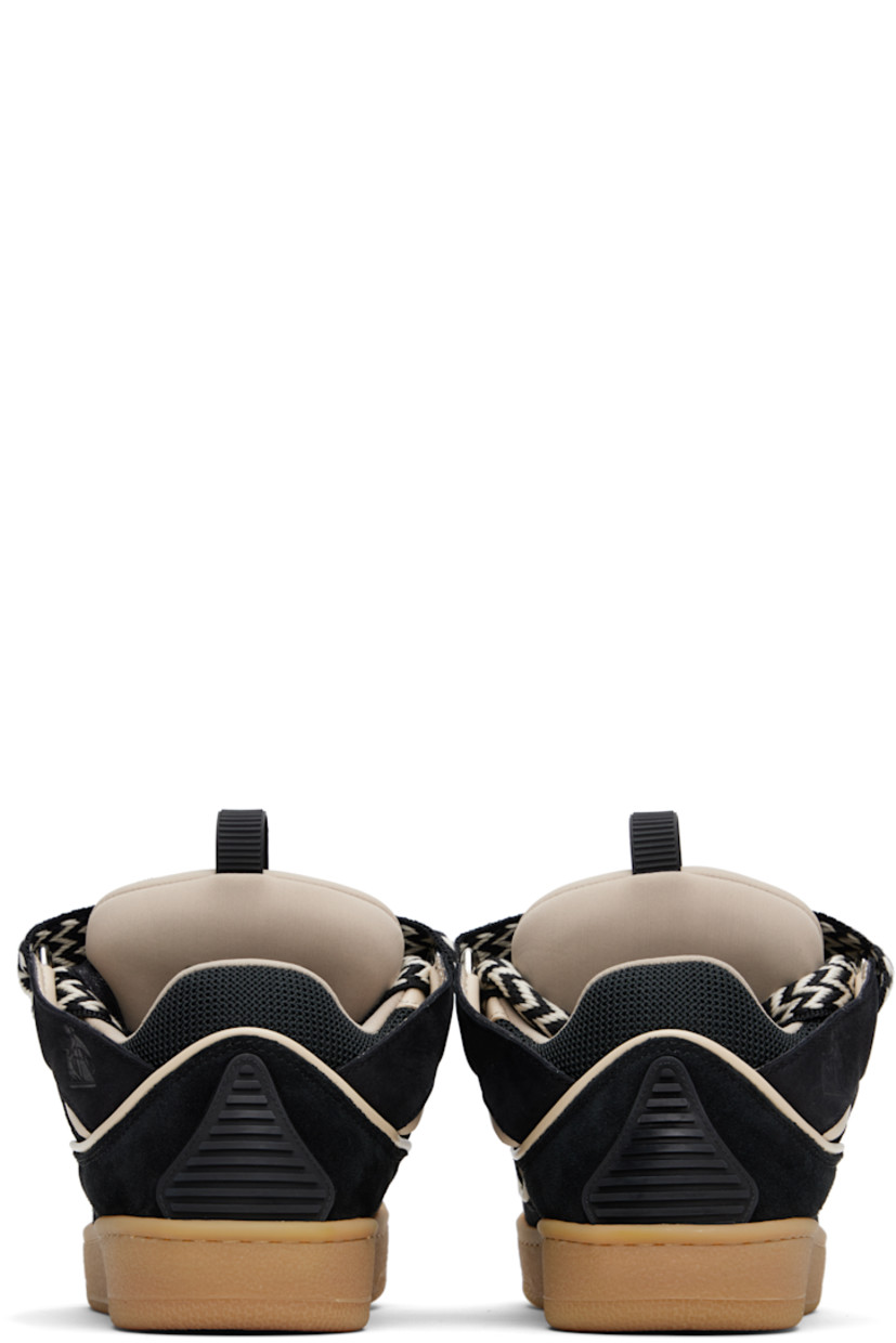 Low-top calfskin nubuck and mesh sneakers in black.

· Piping, cutouts, and rubberized trim throughout
· Perforated detailing at toe 
· Logo embossed at toe and outer side
· Lace-up closure
· Logo plaque and pull-loop at tongue
· Padded tongue and collar
· Jersey lining
· Treaded rubber sole

Available exclusively at SSENSE.

Supplier color: Black/White