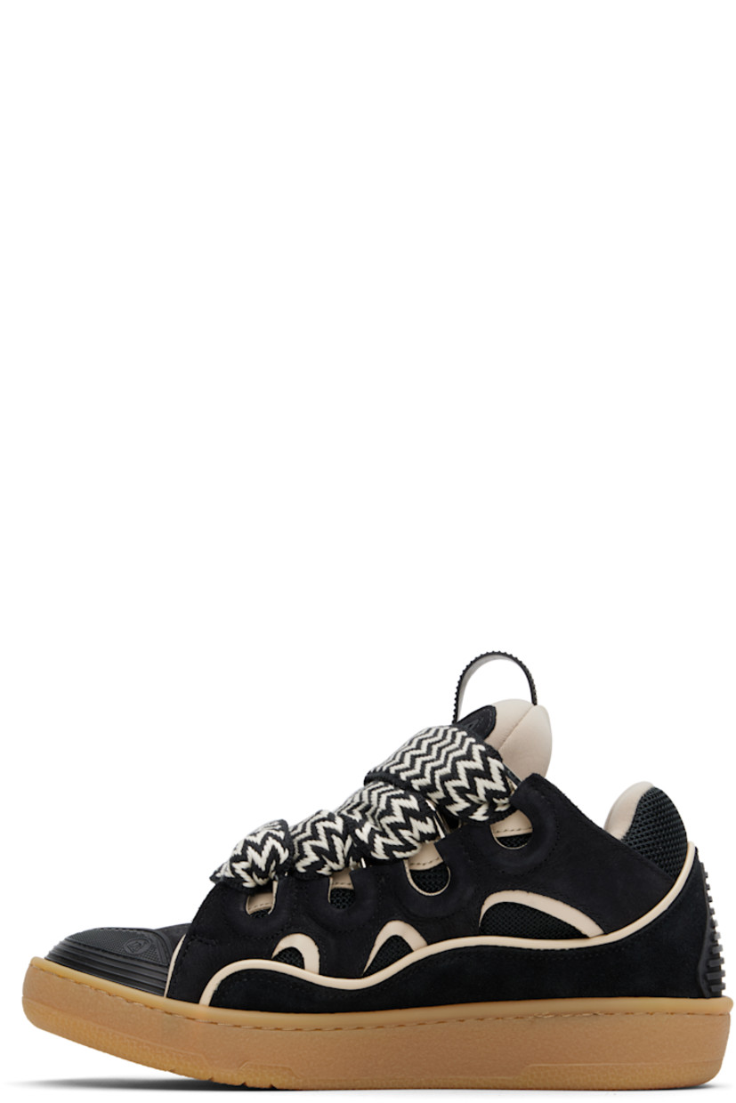 Low-top calfskin nubuck and mesh sneakers in black.

· Piping, cutouts, and rubberized trim throughout
· Perforated detailing at toe 
· Logo embossed at toe and outer side
· Lace-up closure
· Logo plaque and pull-loop at tongue
· Padded tongue and collar
· Jersey lining
· Treaded rubber sole

Available exclusively at SSENSE.

Supplier color: Black/White
