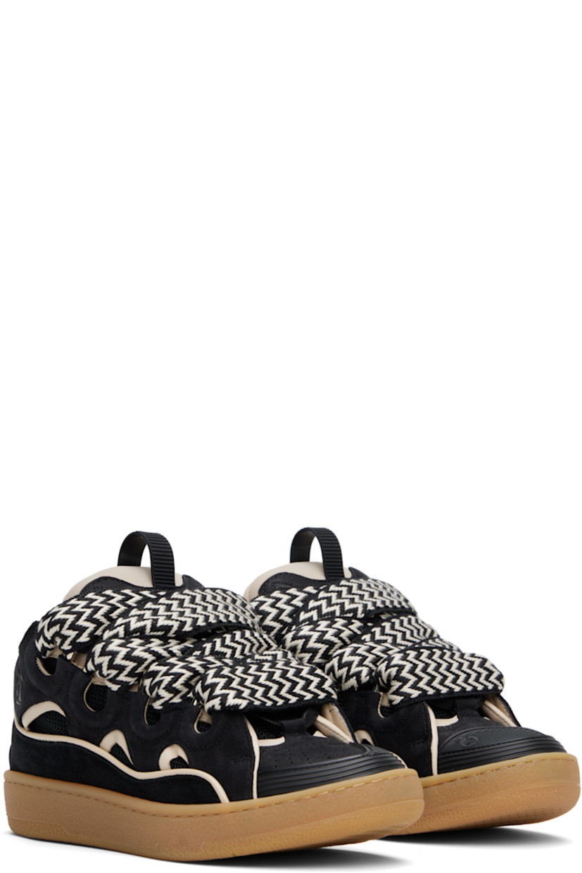 Low-top calfskin nubuck and mesh sneakers in black.

· Piping, cutouts, and rubberized trim throughout
· Perforated detailing at toe 
· Logo embossed at toe and outer side
· Lace-up closure
· Logo plaque and pull-loop at tongue
· Padded tongue and collar
· Jersey lining
· Treaded rubber sole

Available exclusively at SSENSE.

Supplier color: Black/White