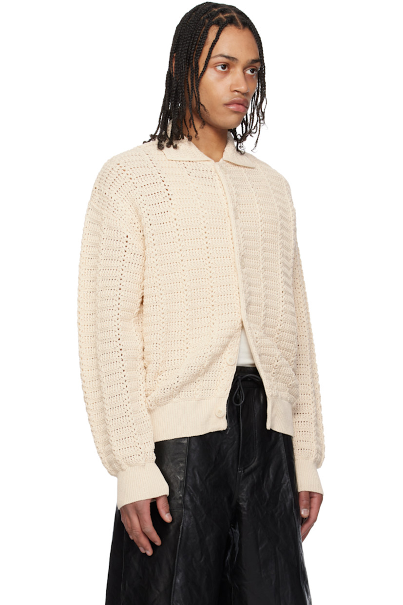 Textured knit cotton-blend cardigan.

· Spread collar
· Button closure
· Rib-knit hem and cuffs
· Dropped shoulders

Supplier color: Natural