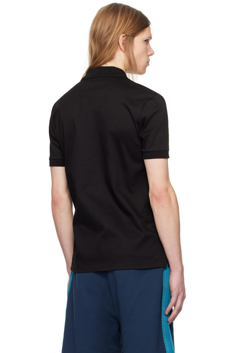 Mercerized cotton jersey polo.

· Rib-knit spread collar and cuffs
· Two-button placket
· Logo embroidered at chest
· Vented side seams

Supplier color: Black