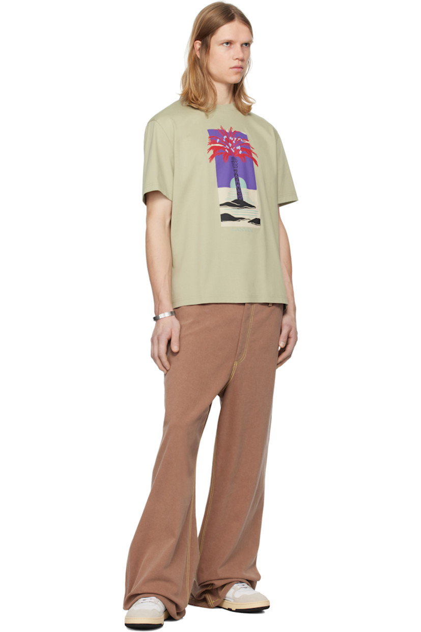 Cotton jersey T-shirt.

· Rib-knit crewneck
· Graphic and logo printed at front
· Patch at back collar

Supplier color: Lin