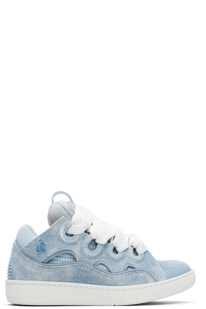 Low-top calfskin suede and ripstop sneakers in blue.

· Trompe l'oeil denim pattern throughout
· Piping, cutouts, and rubberized trim throughout
· Perforated detailing at toe 
· Logo embossed at toe and outer side
· Lace-up closure
· Logo plaque and pull-loop at tongue
· Padded tongue and collar
· Jersey lining
· Treaded rubber sole

Supplier color: Denim blue