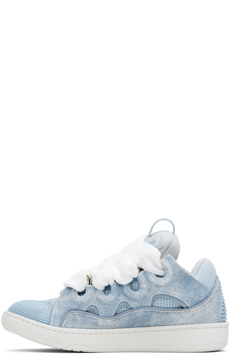 Low-top calfskin suede and ripstop sneakers in blue.

· Trompe l'oeil denim pattern throughout
· Piping, cutouts, and rubberized trim throughout
· Perforated detailing at toe 
· Logo embossed at toe and outer side
· Lace-up closure
· Logo plaque and pull-loop at tongue
· Padded tongue and collar
· Jersey lining
· Treaded rubber sole

Supplier color: Denim blue