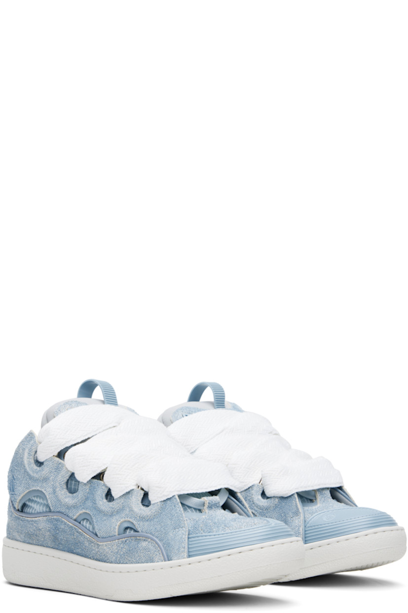 Low-top calfskin suede and ripstop sneakers in blue.

· Trompe l'oeil denim pattern throughout
· Piping, cutouts, and rubberized trim throughout
· Perforated detailing at toe 
· Logo embossed at toe and outer side
· Lace-up closure
· Logo plaque and pull-loop at tongue
· Padded tongue and collar
· Jersey lining
· Treaded rubber sole

Supplier color: Denim blue