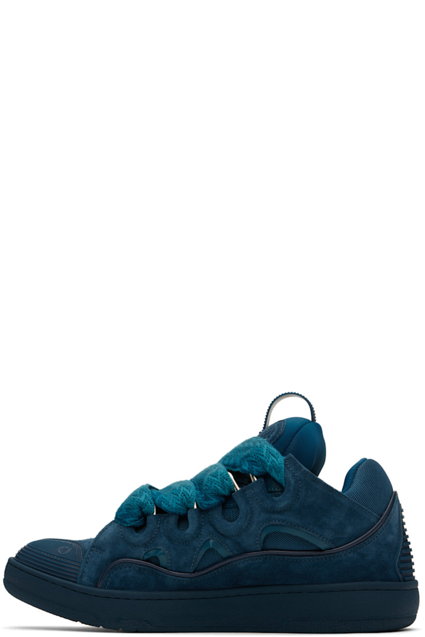 Low-top calfskin suede, grained calfskin, and mesh sneakers in blue.

· Piping, cutouts, and rubberized trim throughout
· Perforations at toe
· Logo embossed at toe and outer side
· Lace-up closure
· Logo plaque and pull-loop at tongue
· Padded tongue and collar
· Jersey lining
· Treaded rubber sole

Supplier color: Petrol blue