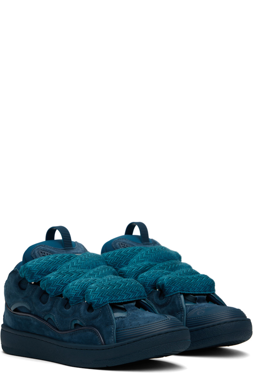 Low-top calfskin suede, grained calfskin, and mesh sneakers in blue.

· Piping, cutouts, and rubberized trim throughout
· Perforations at toe
· Logo embossed at toe and outer side
· Lace-up closure
· Logo plaque and pull-loop at tongue
· Padded tongue and collar
· Jersey lining
· Treaded rubber sole

Supplier color: Petrol blue