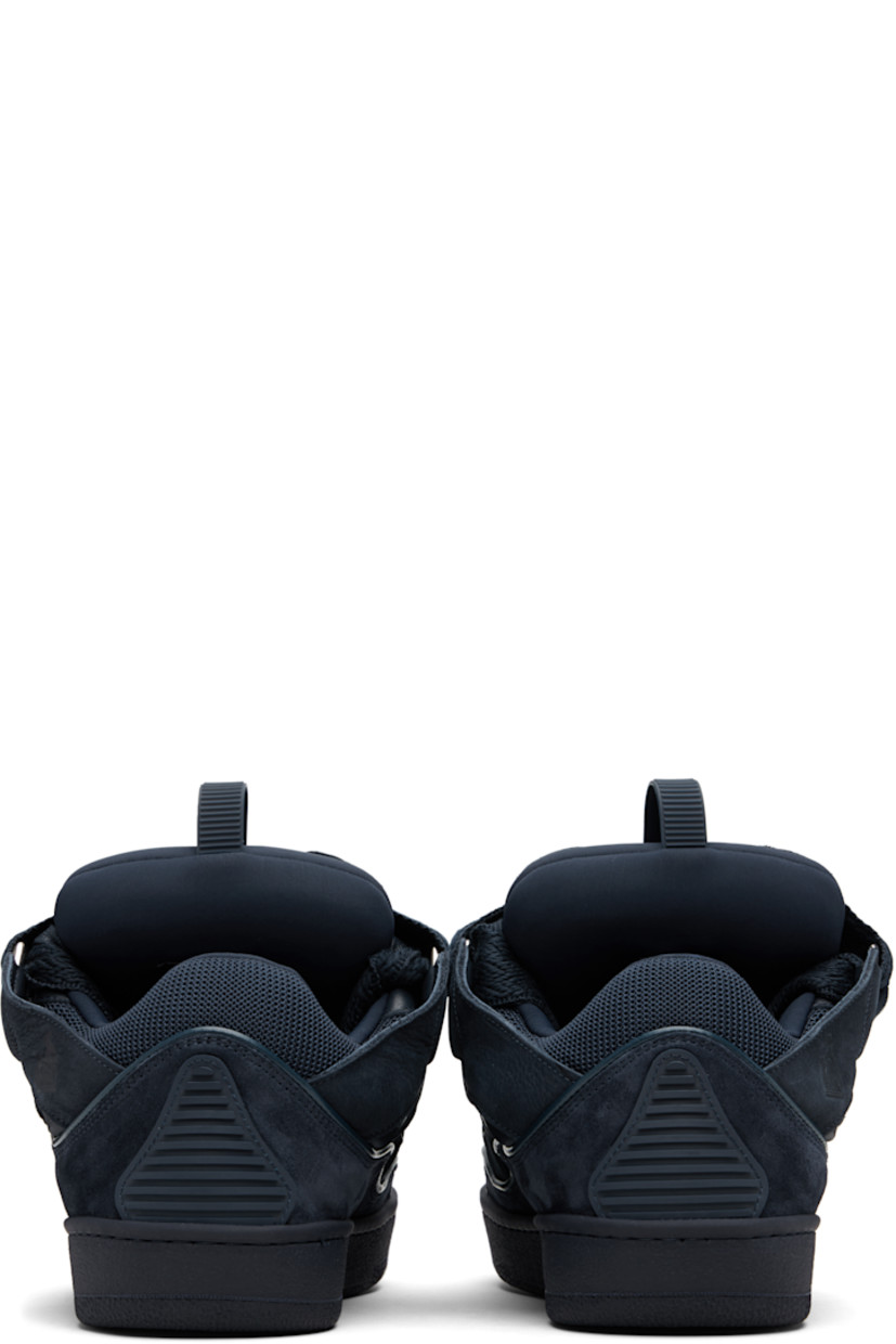 Low-top calfskin suede, grained calfskin, and mesh sneakers. 

· Piping, cutouts, and rubberized trim throughout
· Perforations at toe
· Logo embossed at toe and outer side
· Lace-up closure
· Logo plaque and pull-loop at tongue
· Padded tongue and collar
· Jersey lining
· Treaded rubber sole

Supplier color: Navy blue