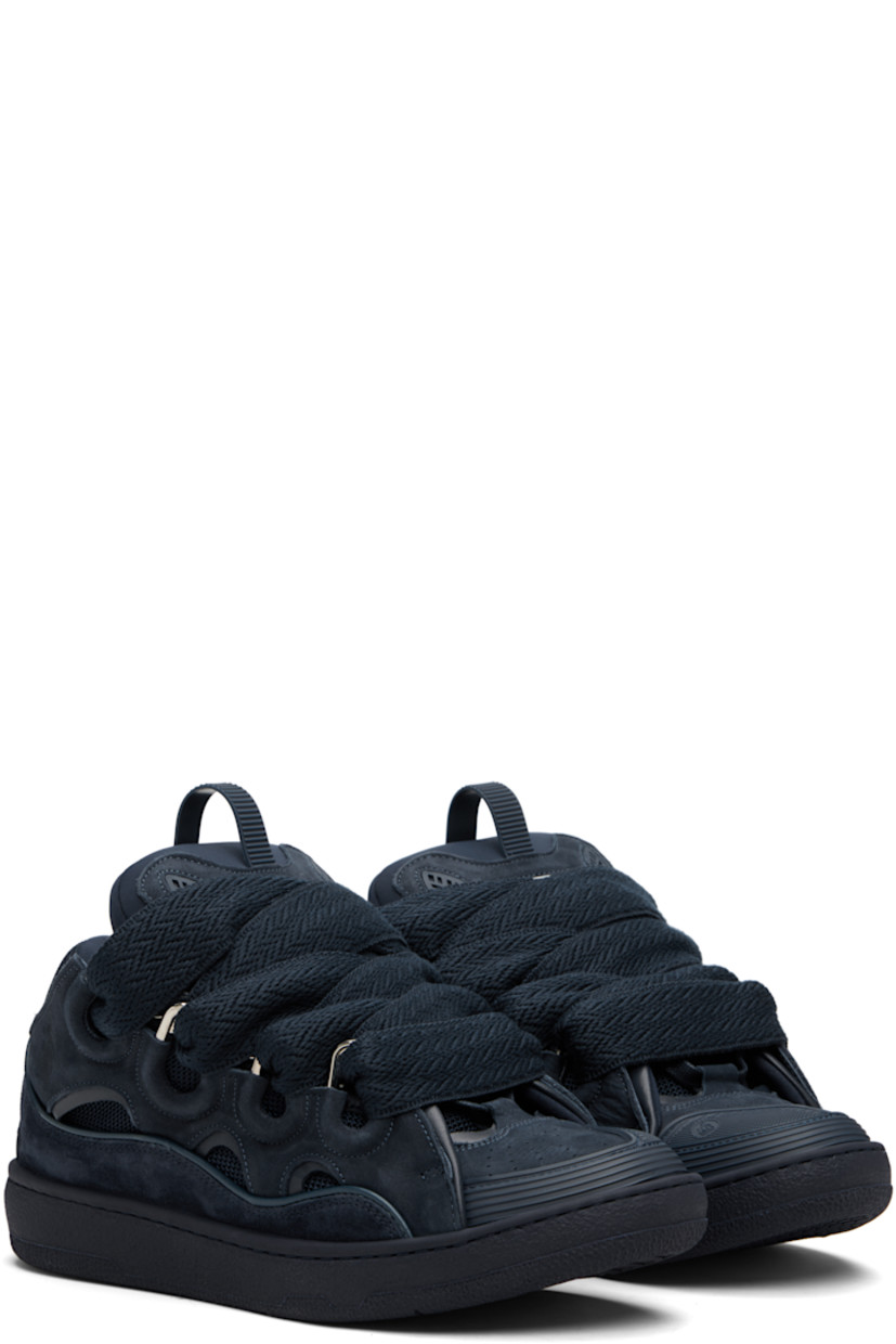 Low-top calfskin suede, grained calfskin, and mesh sneakers. 

· Piping, cutouts, and rubberized trim throughout
· Perforations at toe
· Logo embossed at toe and outer side
· Lace-up closure
· Logo plaque and pull-loop at tongue
· Padded tongue and collar
· Jersey lining
· Treaded rubber sole

Supplier color: Navy blue