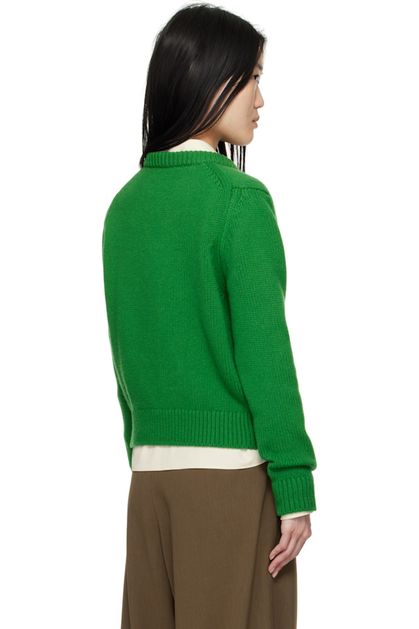 5-gauge knit RWS-certified Geelong lambswool sweater. 

· Pre-shrunk
· Rib-knit V-neck, hem, and cuffs

Supplier color: Pagoda green