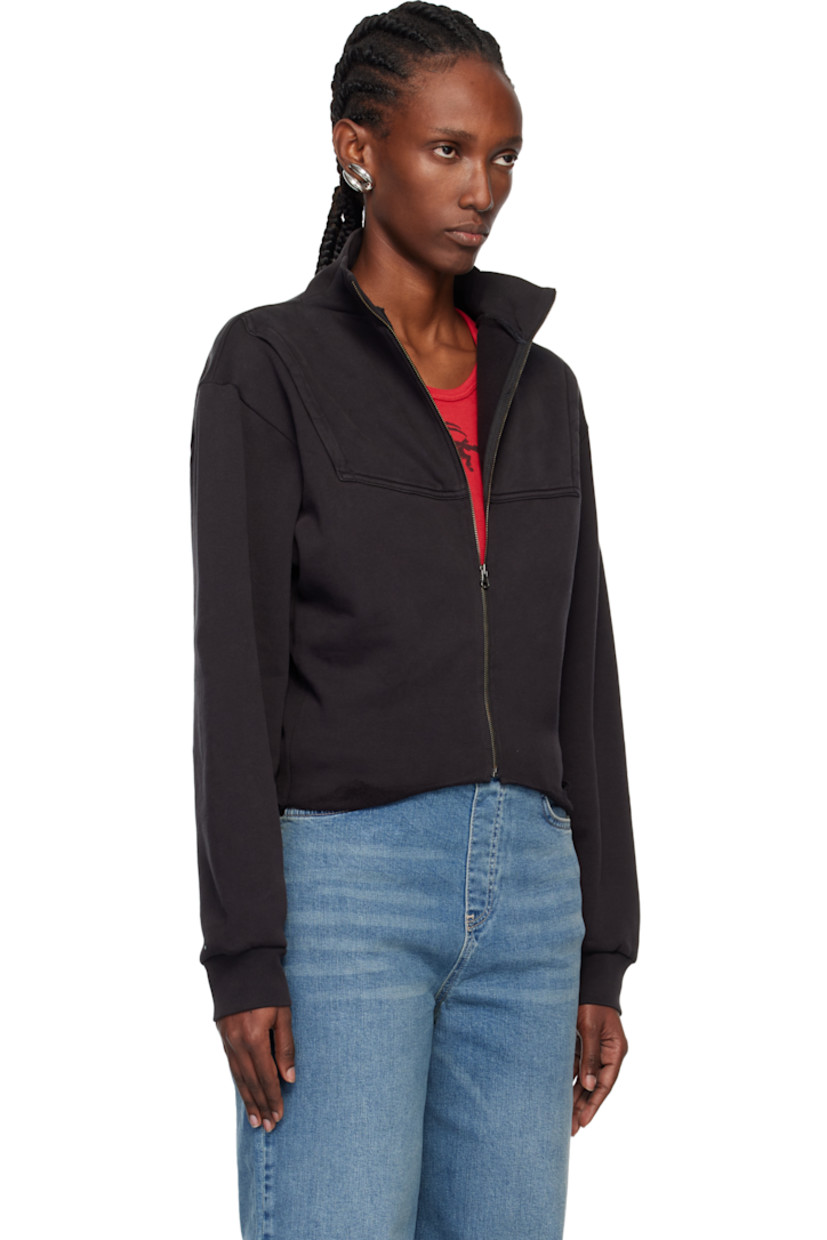 Cotton fleece sweatshirt. Constructed with upcycled sweatshirts.

· Rib-knit stand collar and cuffs
· Patch pockets at chest
· Raw edge at curved hem
· Logo flag at back collar

Supplier color: Zip up black