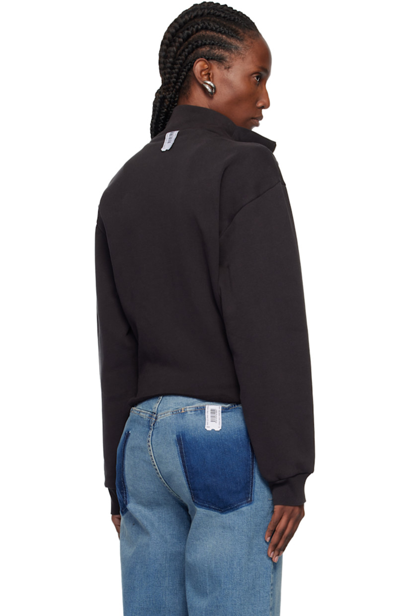 Cotton fleece sweatshirt. Constructed with upcycled sweatshirts.

· Rib-knit stand collar and cuffs
· Patch pockets at chest
· Raw edge at curved hem
· Logo flag at back collar

Supplier color: Zip up black