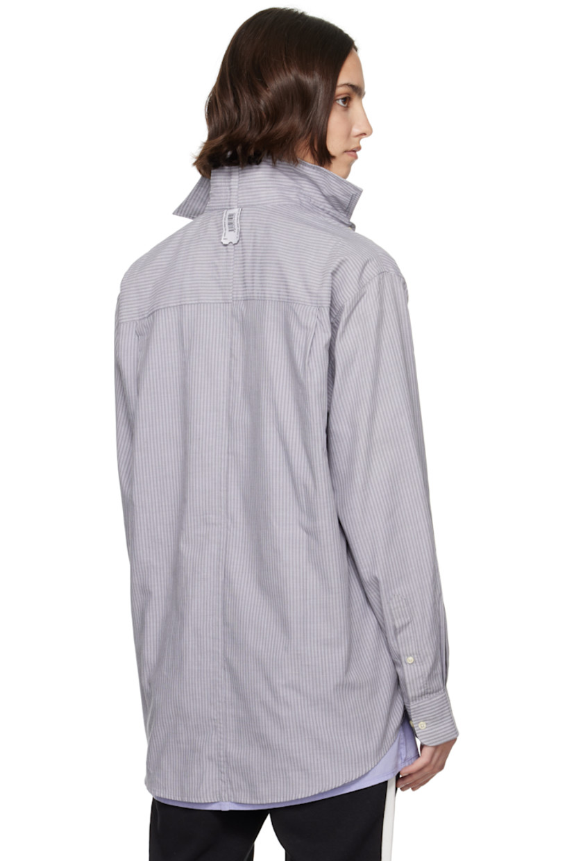 Upcycled cotton oxford cloth shirt. Stripes throughout. 

· Layered construction
· Spread collar
· Button closure
· Patch pocket at chest
· Shirttail hem 
· Logo patch at cuff
· Pleats at buttoned barrel cuffs
· Logo flag at back collar
· Twin pleats at back yoke 

Each item is unique. Please note coloration and finishings may vary.

Supplier color: Mixed colours