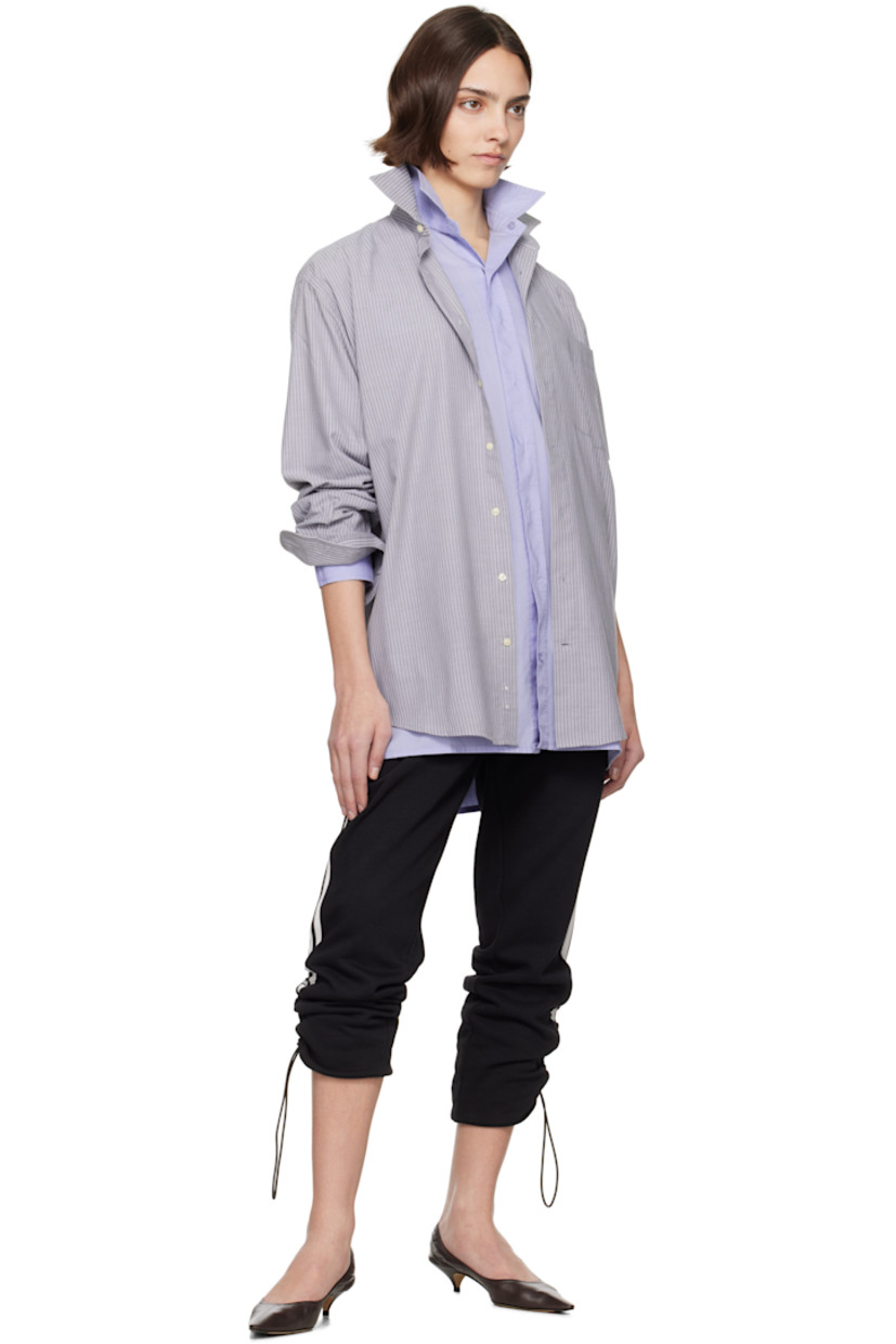 Upcycled cotton oxford cloth shirt. Stripes throughout. 

· Layered construction
· Spread collar
· Button closure
· Patch pocket at chest
· Shirttail hem 
· Logo patch at cuff
· Pleats at buttoned barrel cuffs
· Logo flag at back collar
· Twin pleats at back yoke 

Each item is unique. Please note coloration and finishings may vary.

Supplier color: Mixed colours