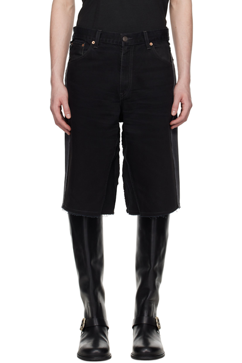 Upcycled non-stretch denim shorts. Fading and raw edges throughout.

· Paneled construction
· Belt loops
· Five-pocket styling
· Zip fly
· Logo flag at back pocket

Each item is unique. Please note coloration and finishings may vary.

Supplier color: Upcycled denim black