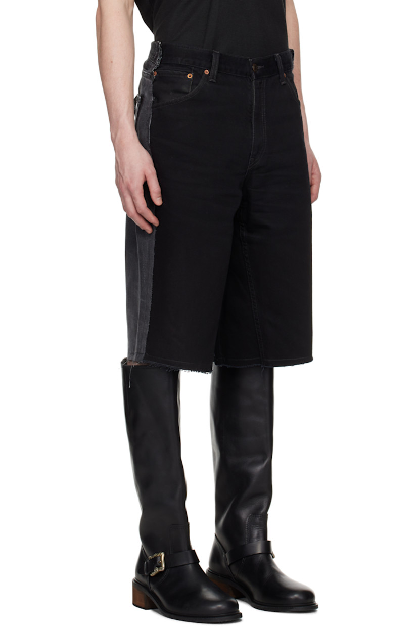 Upcycled non-stretch denim shorts. Fading and raw edges throughout.

· Paneled construction
· Belt loops
· Five-pocket styling
· Zip fly
· Logo flag at back pocket

Each item is unique. Please note coloration and finishings may vary.

Supplier color: Upcycled denim black