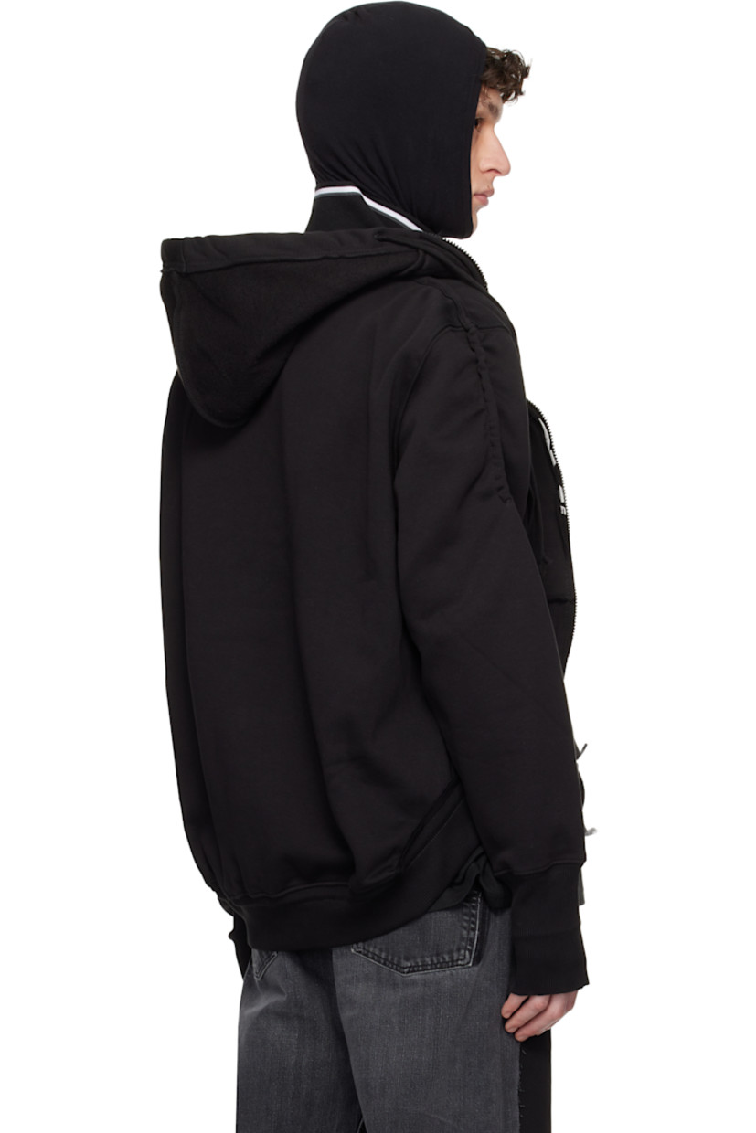 Upcycled cotton-blend fleece hoodie. Raw edges throughout.

· Drawstring at hood
· Funnel neck
· Zip closure
· Logo embroidered at chest
· Patch pockets
· Cord-lock drawstring at hem
· Rib-knit hem and cuffs
· Logo flag at cuff and back collar

Each item is unique. Please note coloration and finishings may vary.

Supplier color: Jersey black