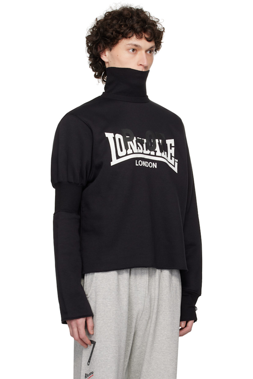 Upcycled cotton-blend fleece turtleneck. 

· Rib-knit collar and cuff
· Logo and text printed at front
· Raw edge at hem and cuff
· Rib-knit panel at sleeve
· Logo flag at cuff and back collar

Each item is unique. Please note coloration and finishings may vary.

Supplier color: Upcycled crewneck black