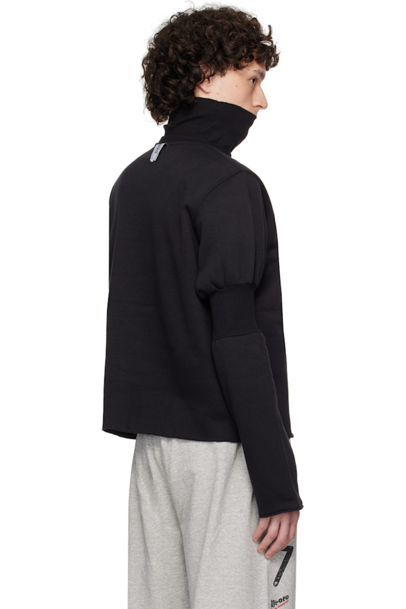 Upcycled cotton-blend fleece turtleneck. 

· Rib-knit collar and cuff
· Logo and text printed at front
· Raw edge at hem and cuff
· Rib-knit panel at sleeve
· Logo flag at cuff and back collar

Each item is unique. Please note coloration and finishings may vary.

Supplier color: Upcycled crewneck black