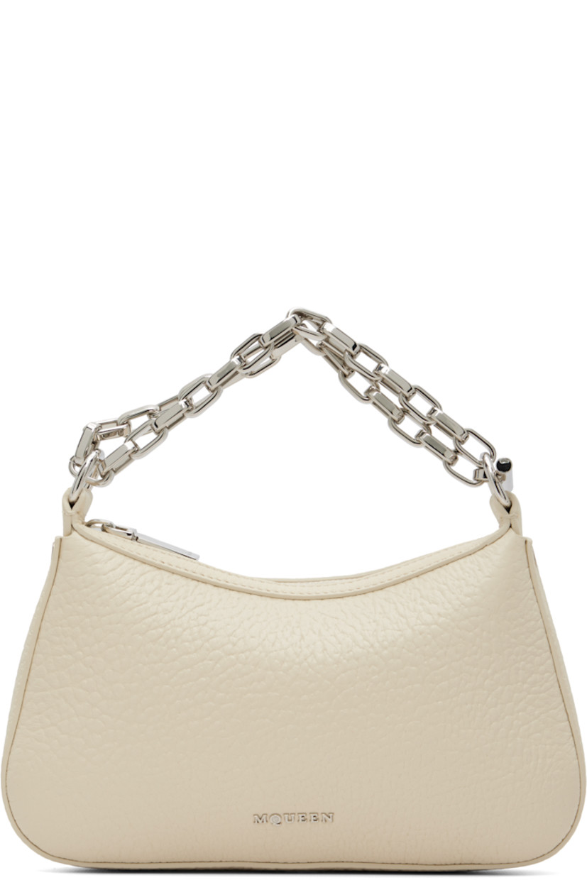 Pebble-grained lambskin shoulder bag.

· Adjustable and semi-detachable curb chain shoulder strap
· Logo hardware at face
· Zip closure
· Card slot at interior
· Nappa leather lining
· Logo-engraved silver-tone hardware
· H5" x W8.75" x D1.5"

Supplier color: Cream
