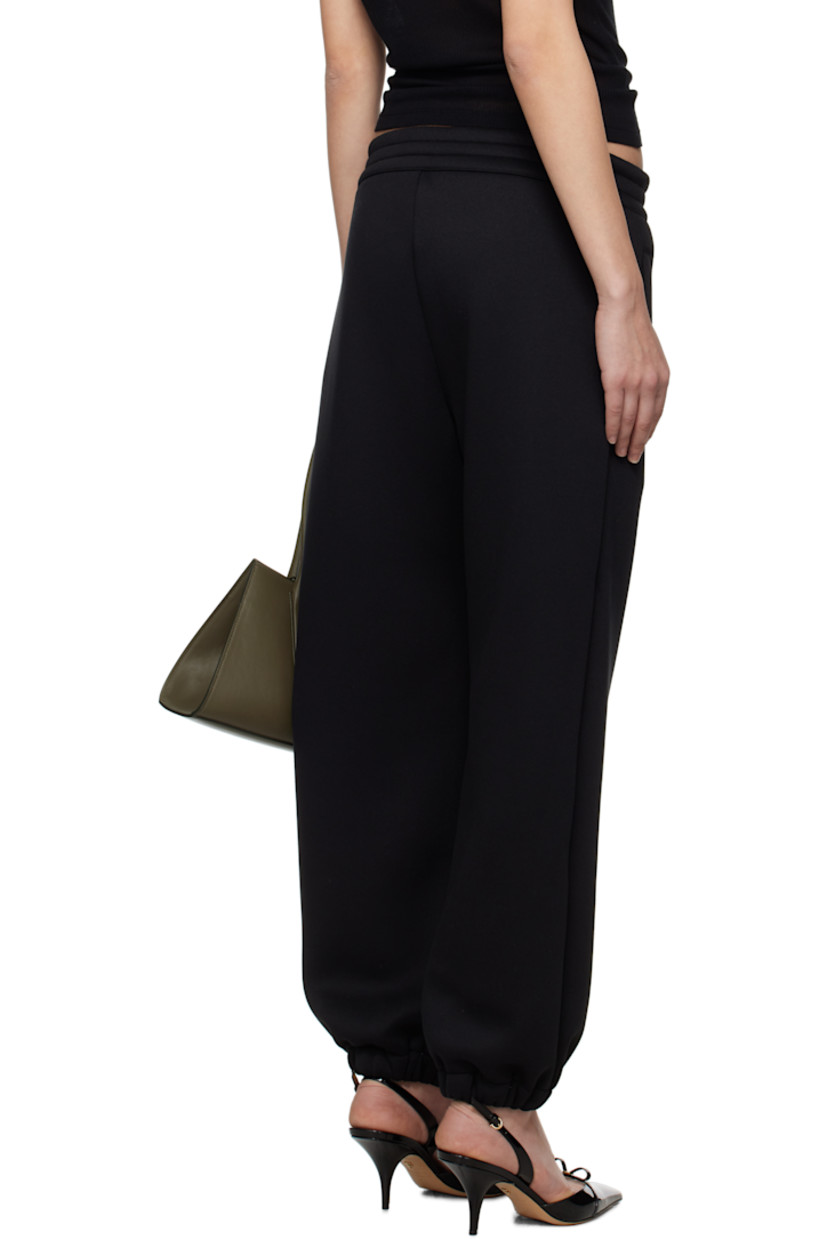 Polyester jersey lounge pants. 

· Drawstring at elasticized waistband
· Two-pocket styling
· Logo graphic embroidered at front
· Elasticized cuffs

Supplier color: Black