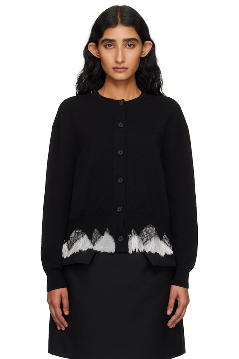 Knit wool- and cashmere-blend cardigan.

· Pre-shrunk 
· Rib-knit crewneck, hem, and cuffs
· Button closure
· Lace and silk crepon trim with raw edges at hem 

Supplier color: Black