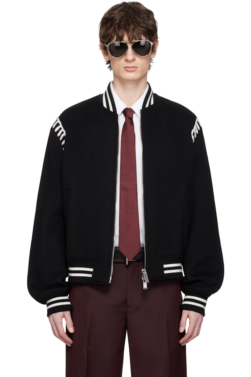 Felted stretch wool bomber jacket. 

· Striped rib-knit spread collar, hem, and cuffs
· Two-way zip closure
· Welt pockets
· Blanket stitching at shoulders
· Welt pockets at interior 
· Full twill lining
· Logo-engraved silver-tone hardware

Supplier color: Black