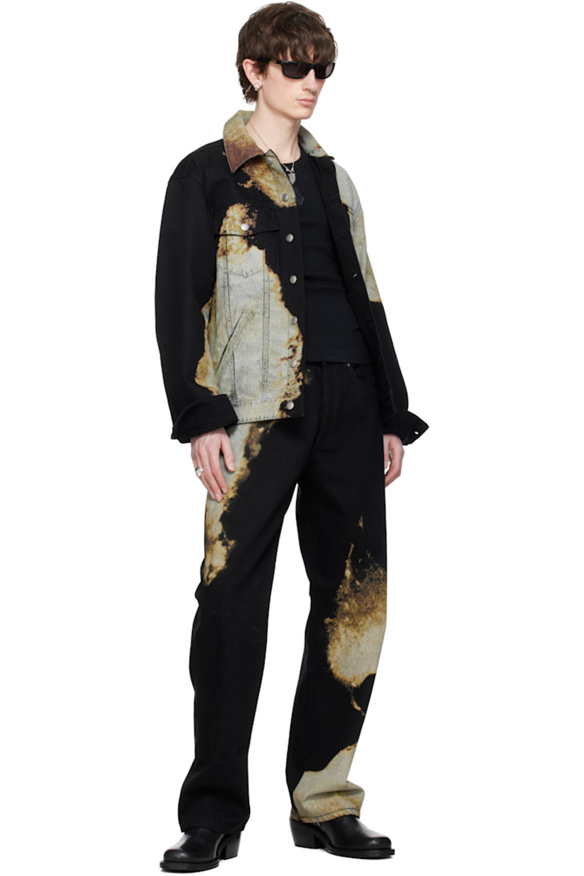 Washed non-stretch denim jacket. Fading and printed pattern throughout.

· Spread collar
· Button closure
· Flap pockets and welt pockets
· Buttoned barrel cuffs
· Button tabs at back hem
· Logo-engraved antiqued silver-tone hardware

Supplier color: Black/Ivory
