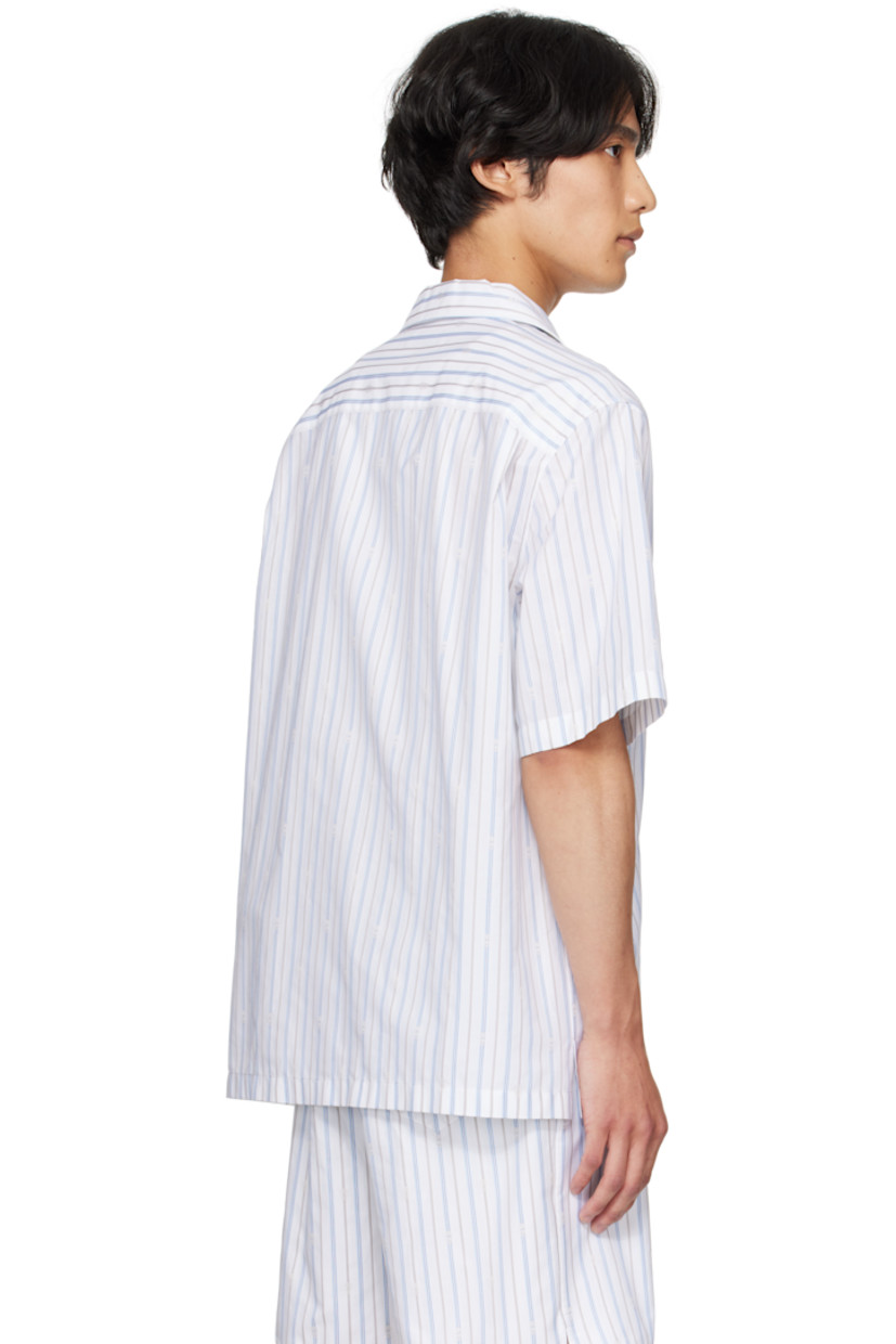 Cotton poplin shirt.

· Striped logo pattern throughout
· Open spread collar
· Button closure
· Patch pocket at chest
· Vented side seams
· Twin pleats at back yoke
· Mother-of-pearl hardware

Supplier color: White/Blue/Grey