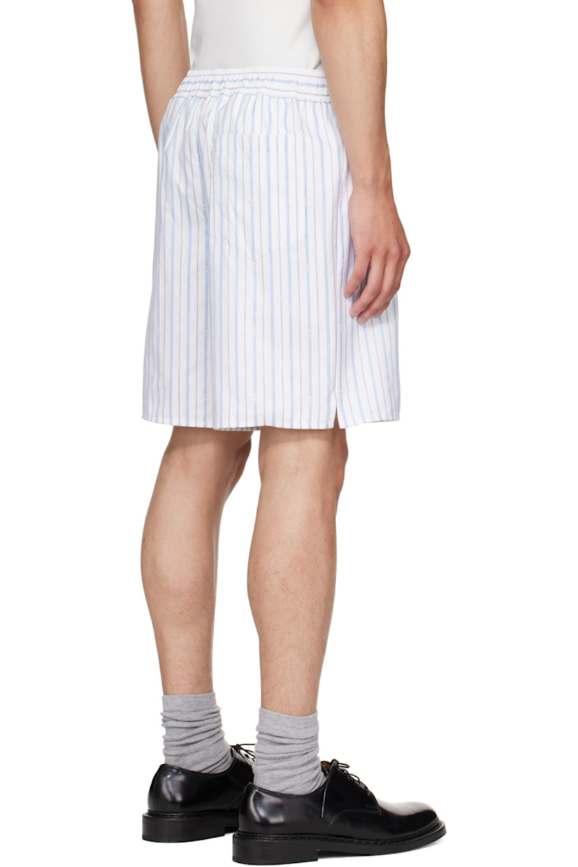 Cotton poplin shorts.

· Striped logo pattern throughout
· Adjustable button tabs at partially elasticized waistband
· Three-pocket styling
· Mock fly
· Vented outseams

Supplier color: White/Blue/Grey