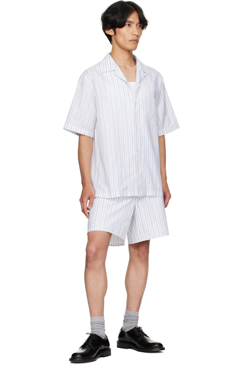 Cotton poplin shorts.

· Striped logo pattern throughout
· Adjustable button tabs at partially elasticized waistband
· Three-pocket styling
· Mock fly
· Vented outseams

Supplier color: White/Blue/Grey