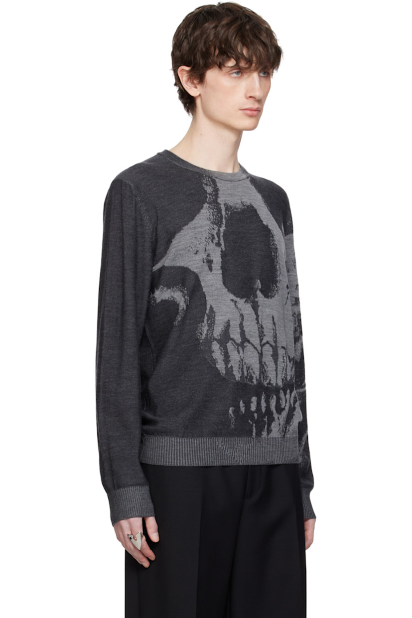 Knit wool sweater. 

· Crewneck
· Jacquard logo graphic at front 
· Rib-knit hem and cuffs

Supplier color: Black/Grey