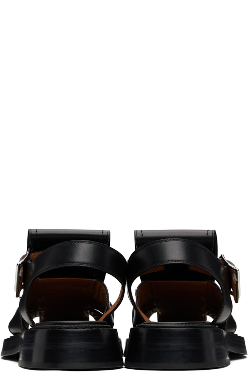 Buffed calfskin sandals.

· Cutouts and logo-engraved pin-buckle hardware at vamp
· Pin-buckle ankle strap
· Logo printed at leather footbed
· Stacked leather heel and midsole
· Logo embossed at rubber sole

Supplier color: Black