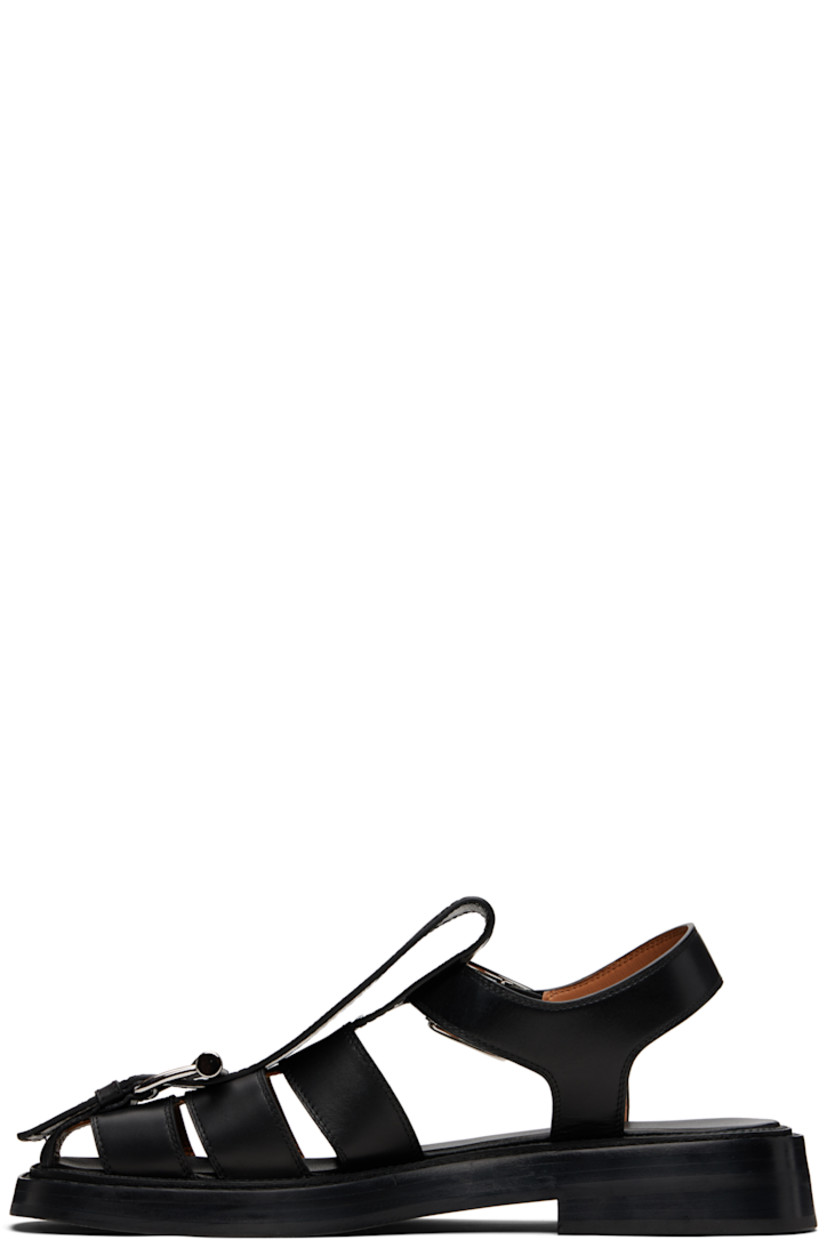 Buffed calfskin sandals.

· Cutouts and logo-engraved pin-buckle hardware at vamp
· Pin-buckle ankle strap
· Logo printed at leather footbed
· Stacked leather heel and midsole
· Logo embossed at rubber sole

Supplier color: Black