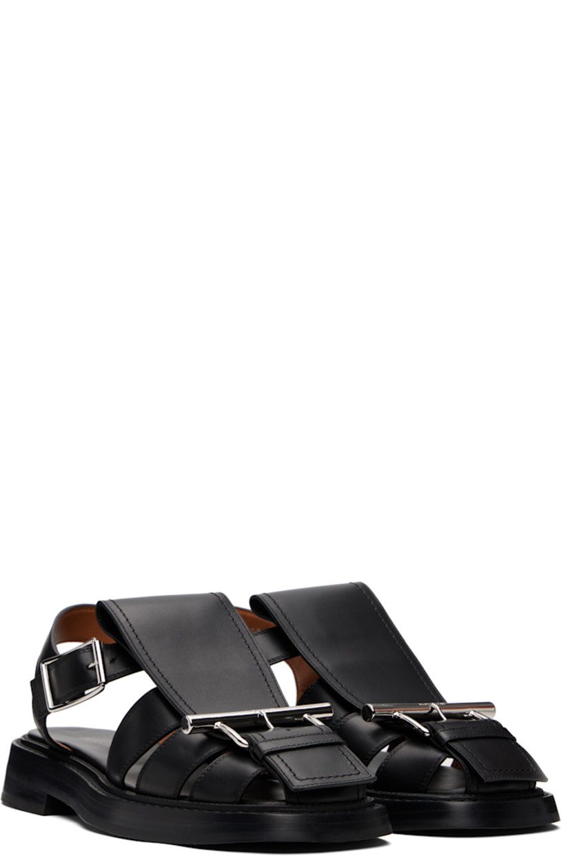 Buffed calfskin sandals.

· Cutouts and logo-engraved pin-buckle hardware at vamp
· Pin-buckle ankle strap
· Logo printed at leather footbed
· Stacked leather heel and midsole
· Logo embossed at rubber sole

Supplier color: Black