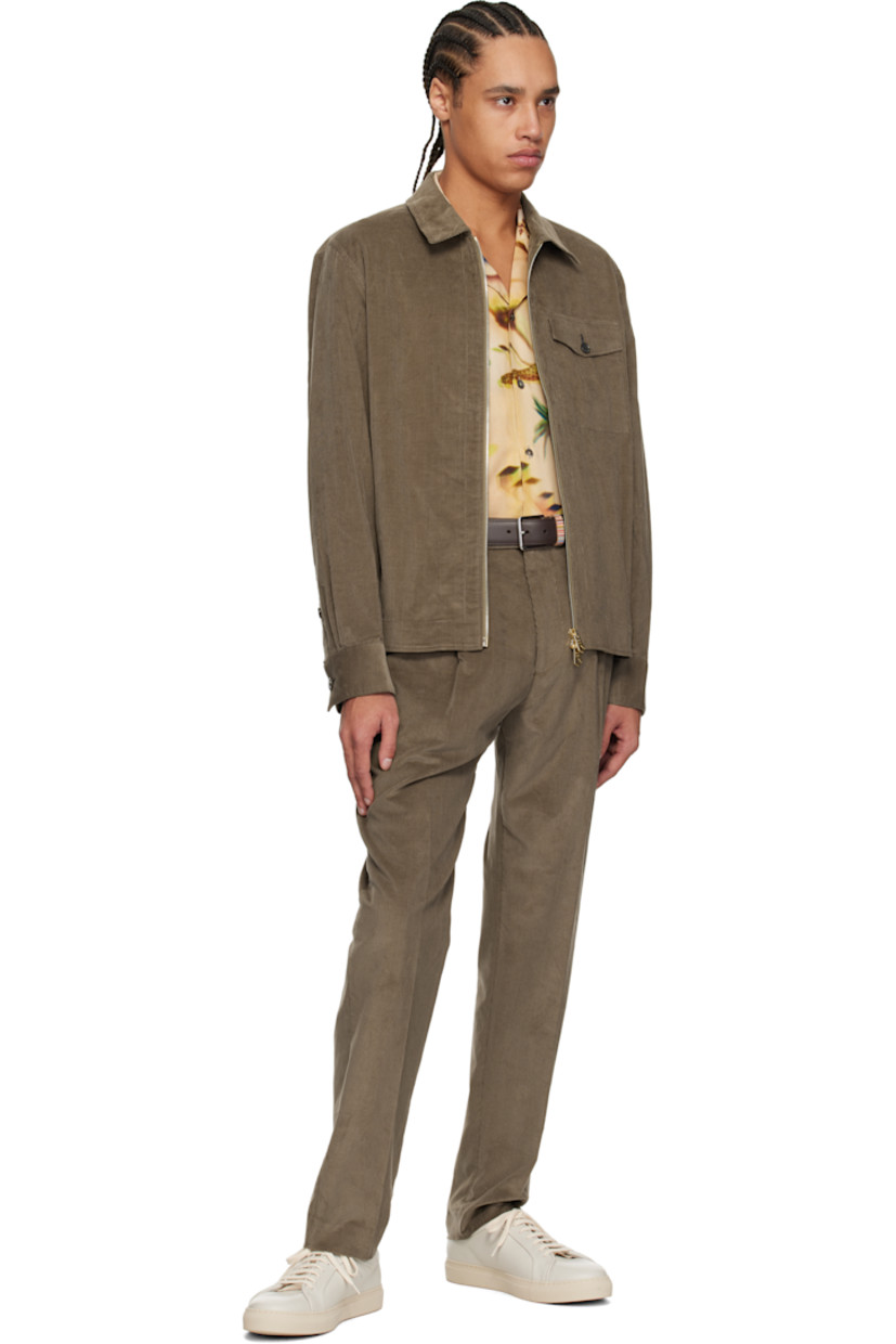 Cotton corduroy jacket. 

· Spread collar
· Two-way zip closure
· Pleats at buttoned barrel cuffs
· Rivets at back collar
· Inverted box pleat at back yoke

Supplier color: Brown