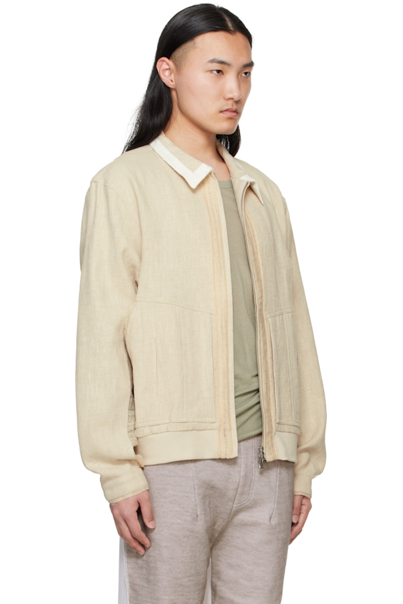 Polyester twill jacket. Raw edges, seersucker trim, and laddering throughout.

· Spread collar
· Two-way zip closure
· Welt pockets
· Pleats at front 
· Rib-knit hem 
· Press-stud barrel cuffs
· Central seam at back 

Supplier color: Ivory