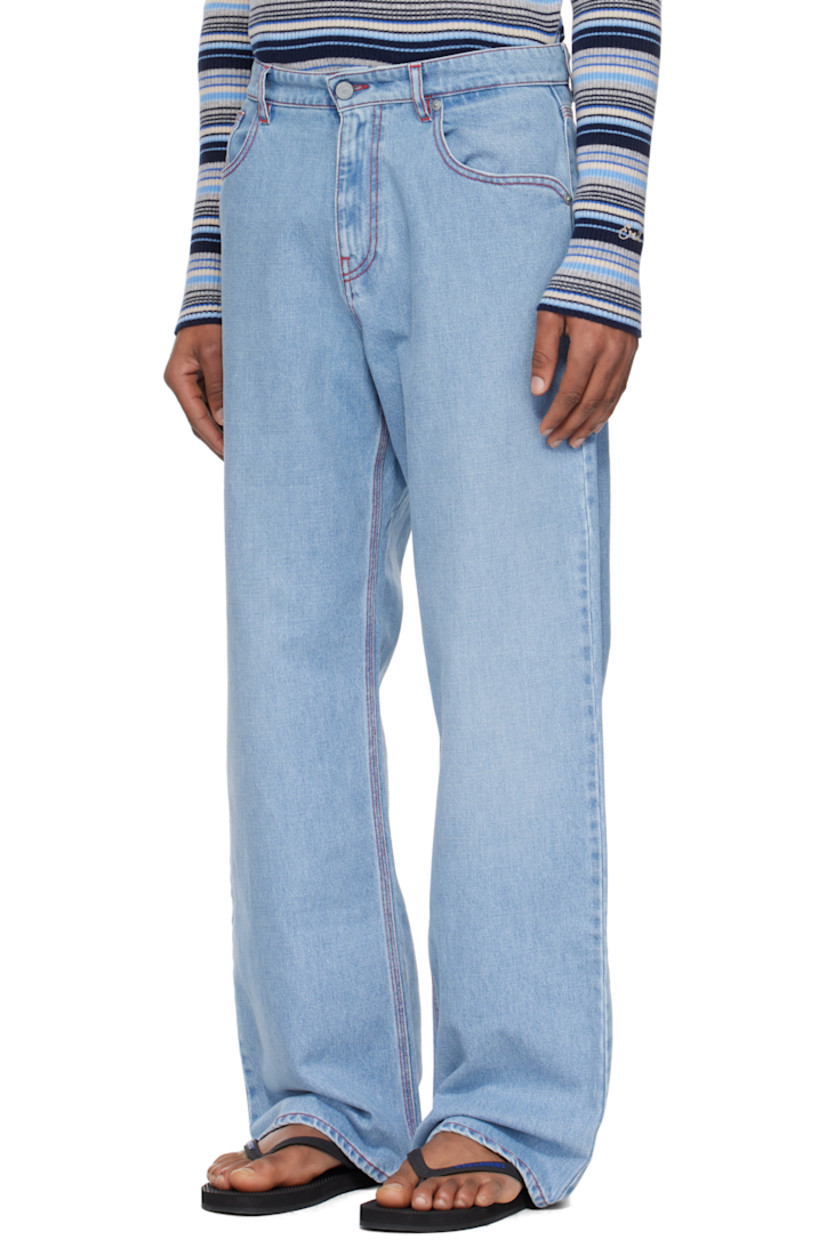 Straight-leg non-stretch denim jeans. Fading throughout.

· Belt loops
· Five-pocket styling
· Zip fly
· Logo flag at back pocket
· Logo-engraved antiqued silver-tone hardware
· Contrast stitching in red

Supplier color: Blue