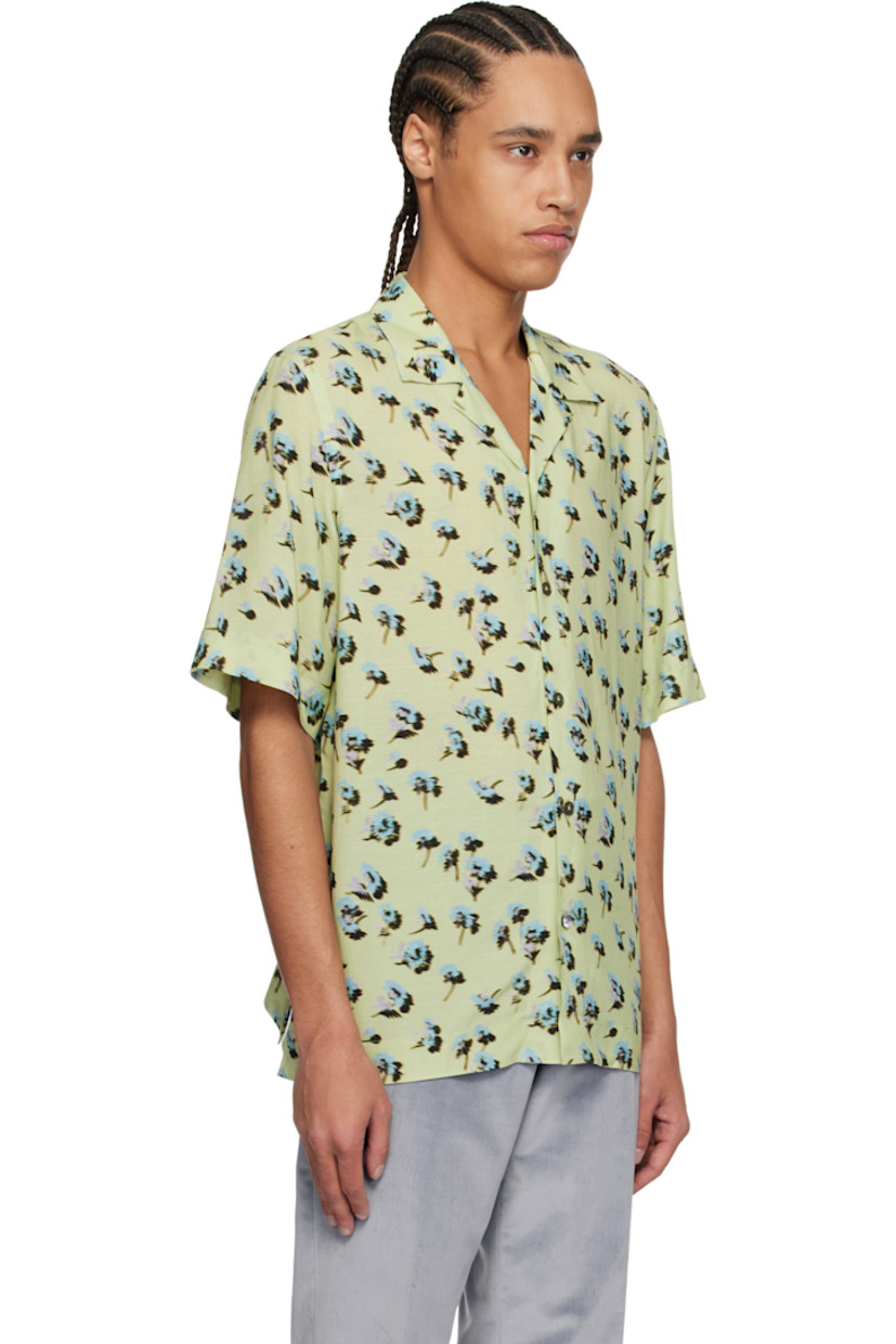 Viscose- and linen-blend chambray shirt. Floral pattern printed throughout. 

· Button fastening at open spread collar 
· Button closure
· Vented side seams 
 
Supplier color: Green
