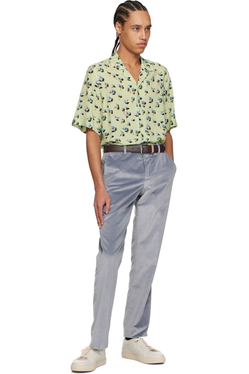 Viscose- and linen-blend chambray shirt. Floral pattern printed throughout. 

· Button fastening at open spread collar 
· Button closure
· Vented side seams 
 
Supplier color: Green