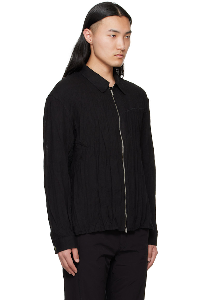 Semi-sheer crinkled plain-woven linen-blend shirt. 

· Spread collar
· Two-way Excella® zip closure
· Topstitching at chest and yoke 
· Droptail hem
· Seersucker trim at sleeves and side seams 
· Buttoned barrel cuffs
· Inverted box pleat at yoke

Supplier color: Black