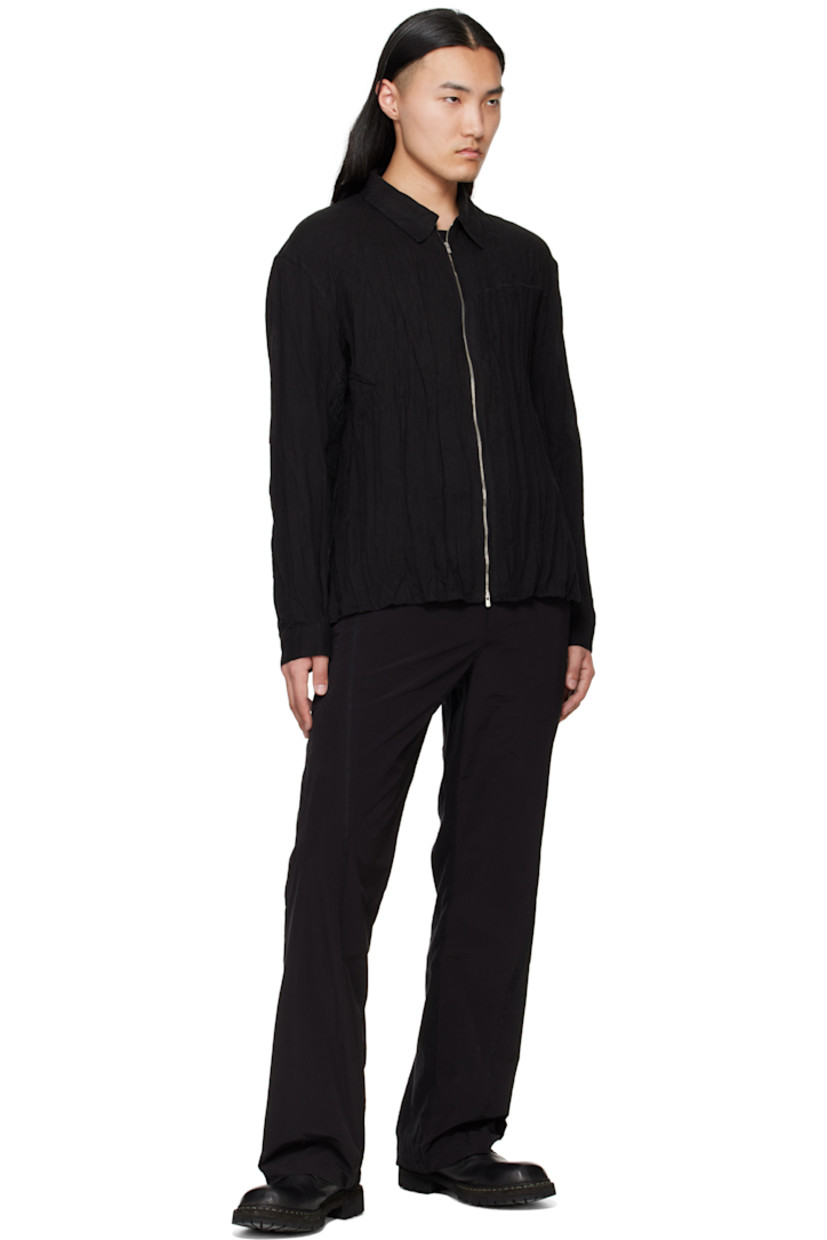 Semi-sheer crinkled plain-woven linen-blend shirt. 

· Spread collar
· Two-way Excella® zip closure
· Topstitching at chest and yoke 
· Droptail hem
· Seersucker trim at sleeves and side seams 
· Buttoned barrel cuffs
· Inverted box pleat at yoke

Supplier color: Black