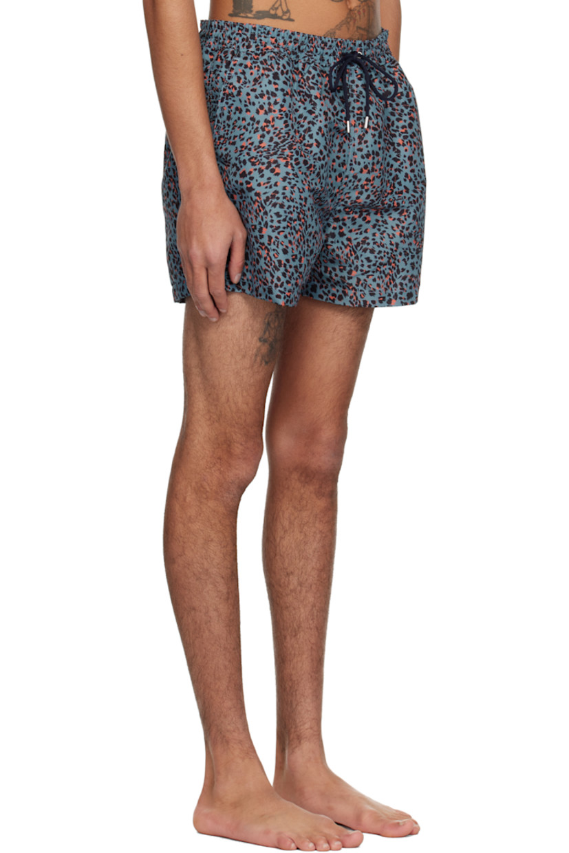 Recycled polyester taffeta swim shorts. Leopard pattern printed throughout.

· Drawstring and logo flag at elasticized waistband
· Three-pocket styling
· Vented outseams
· Locker loop at back waistband
· Briefs-style mesh lining

Supplier color: Blue