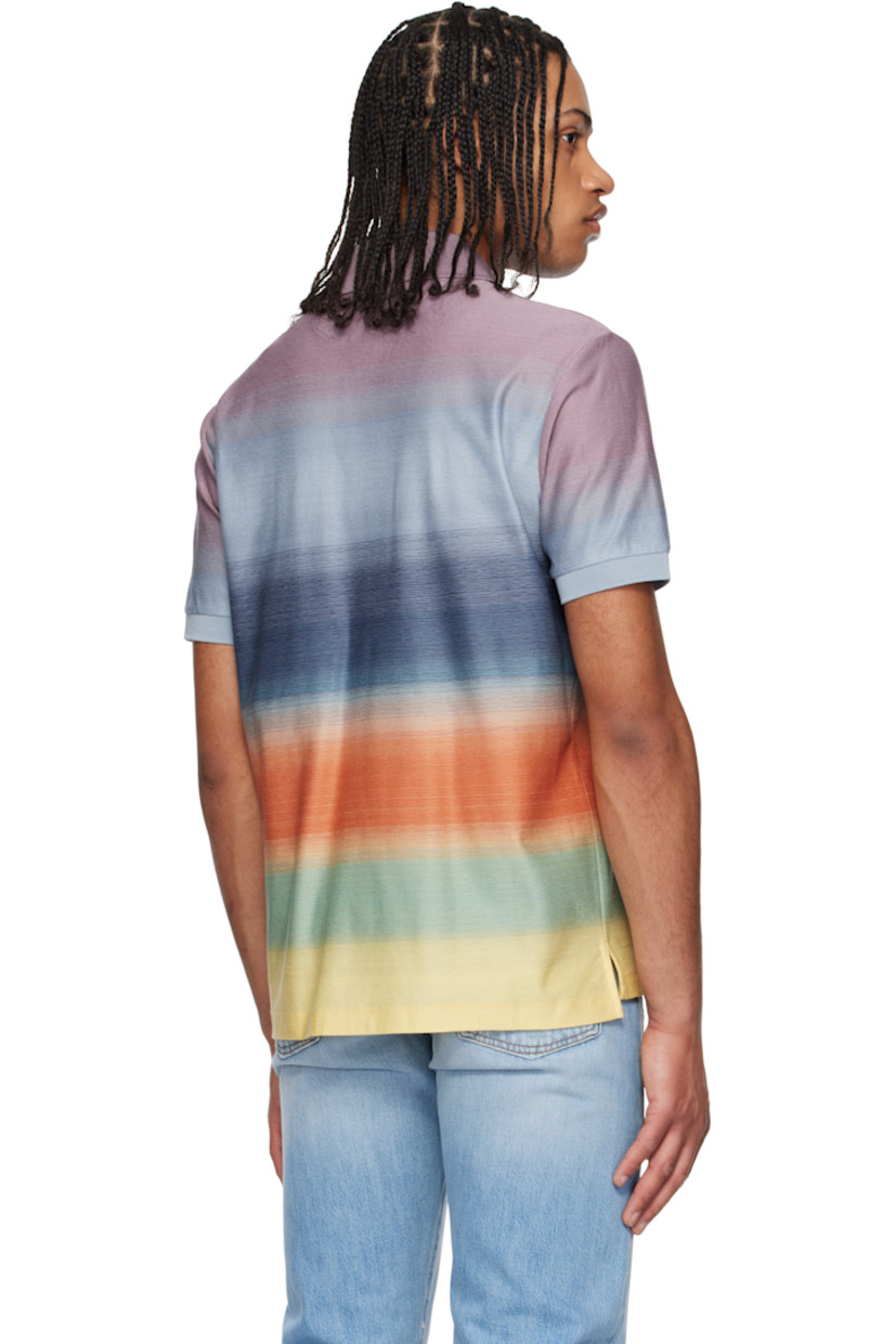 Knit cotton polo. Jacquard gradient stripe pattern throughout.

· Rib-knit spread collar and cuffs
· Two-button placket
· Tennis-tail hem

Supplier color: Multicolour