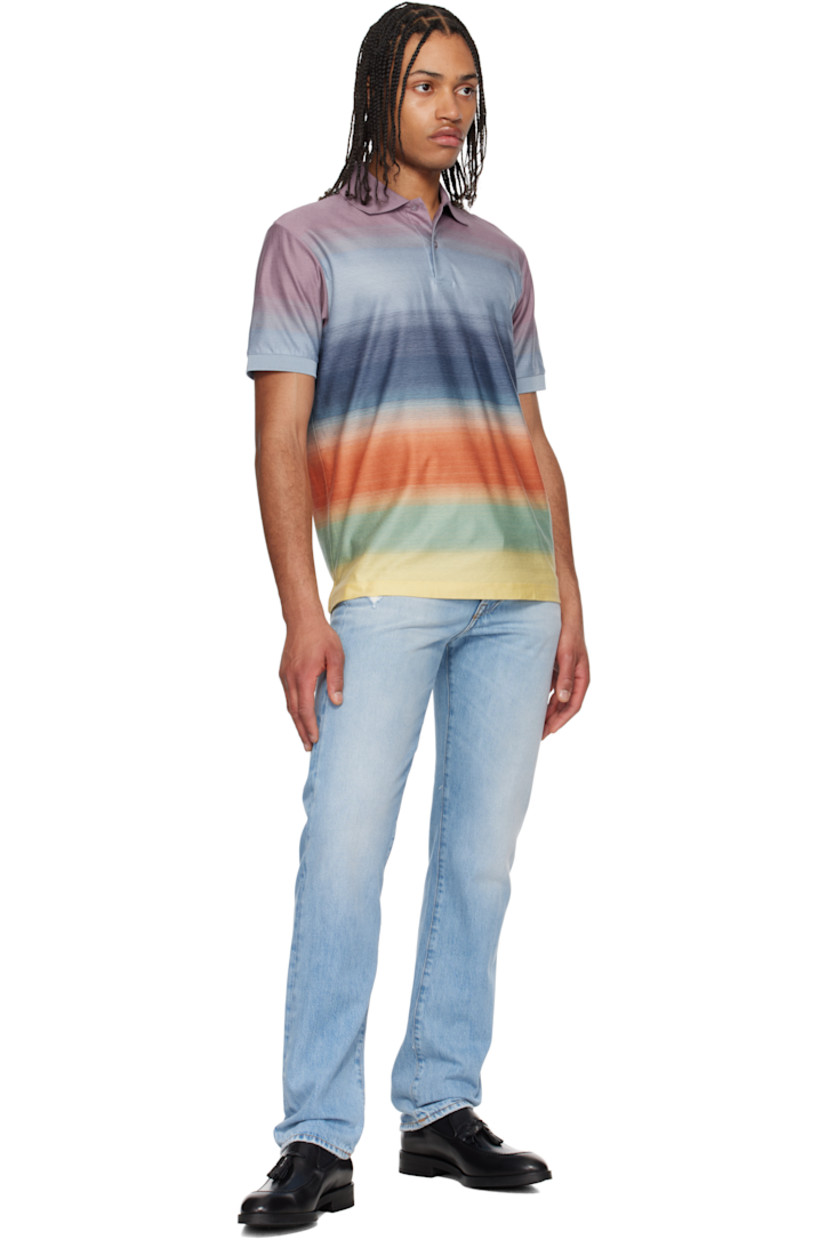 Knit cotton polo. Jacquard gradient stripe pattern throughout.

· Rib-knit spread collar and cuffs
· Two-button placket
· Tennis-tail hem

Supplier color: Multicolour
