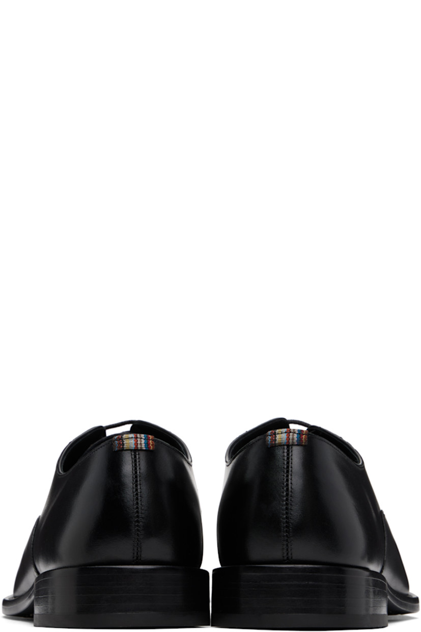 Buffed leather derbys in black.

· Lace-up closure
· Signature striped grosgrain patch at heel collar
· Buffed leather lining
· Leather block heel with rubber injection
· Treaded leather sole

Supplier color: Black