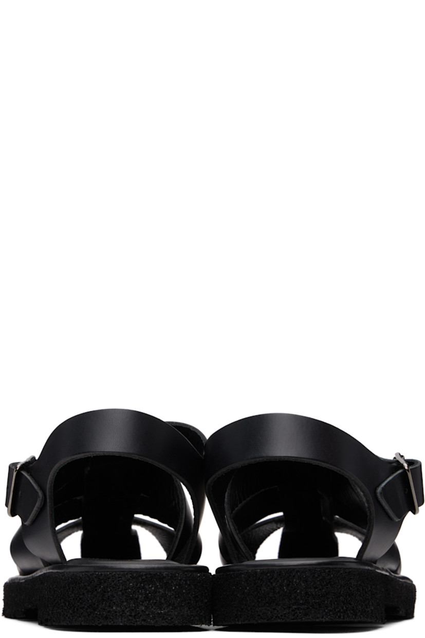 Woven buffed leather sandals in black.

· Pin-buckle ankle strap
· Logo stamp at padded footbed
· Treaded Rubex® rubber sole

Supplier color: Black